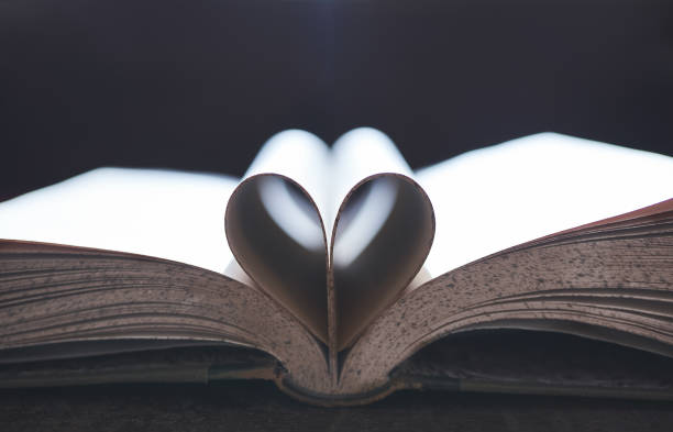 istock Open book with the shape of a heart 1288502193