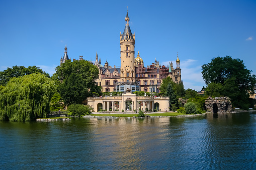 Exterior of Schwerin Castle in Germany against a clear blue sky