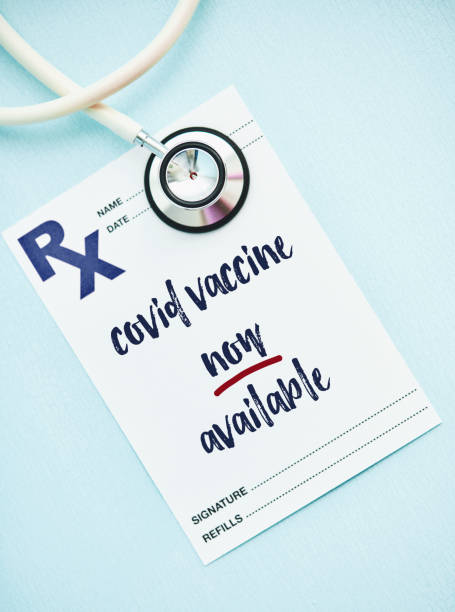 istock Prescription Form with message. Vaccine for COVID-19 Coronavirus Available Now 1288508317