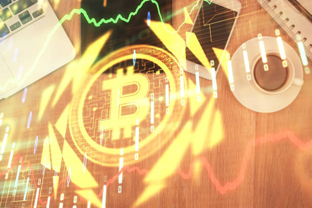 istock Double exposure of blockchain theme hologram over table with phone. Top view. Crypto technology concept. 1288508321