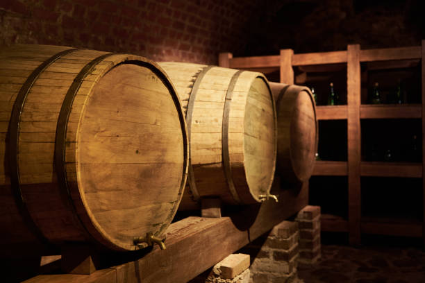 istock Two wine barrels in old wine cellar 1288509707