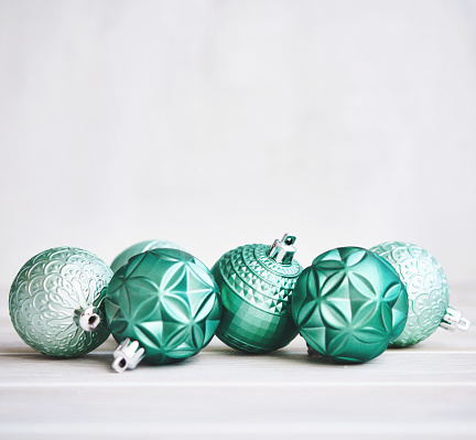 Christmas Background with Teal Green Ornaments