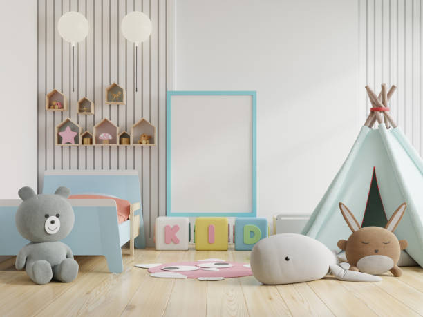 istock Mock up poster frame in children room. 1288513701