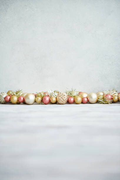 istock Glittering Christmas Background with Pink and Rose Gold Decorations 1288524965