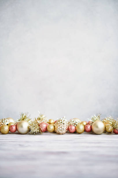 istock Glittering Christmas Background with Pink and Rose Gold Decorations 1288525073