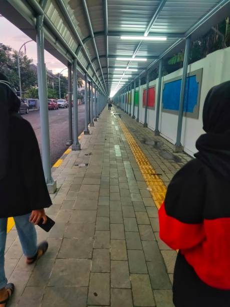 istock Asian Muslim Woman Walking 1288532778