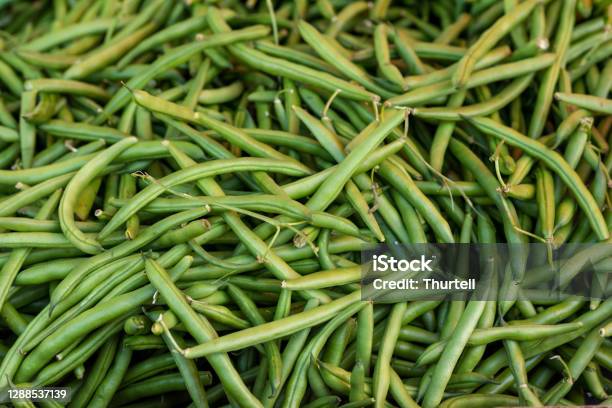 Organic Spring Onion On Display At Farmers Market Stock Photo - Download Image Now - Runner Bean, Abundance, Agriculture