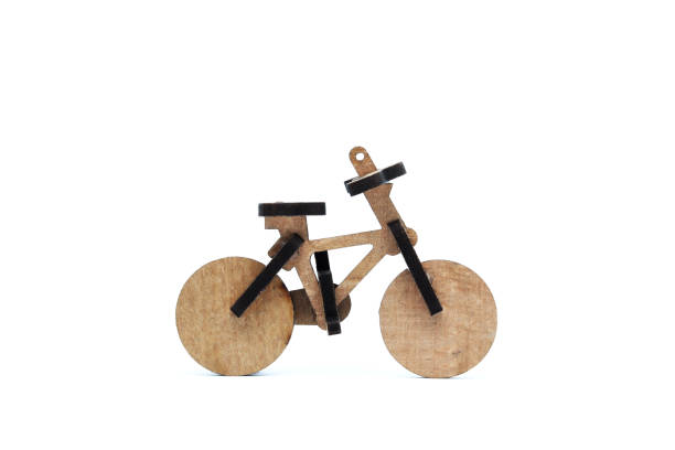 Bicycle model toy decorate in green garden and bokeh background