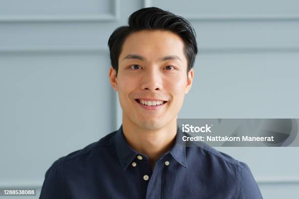 Portrait Young Confident Smart Asian Businessman Look At Camera And Smile Stock Photo - Download Image Now