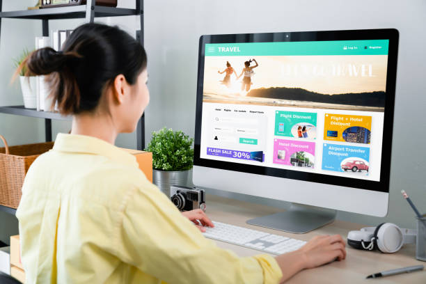 istock Woman using application booking flight travel search ticket holiday and hotel on website discounted price, concept technology online marketing. 1288547543