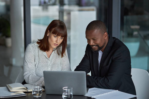istock Pouring some extra hours into the job 1288552120