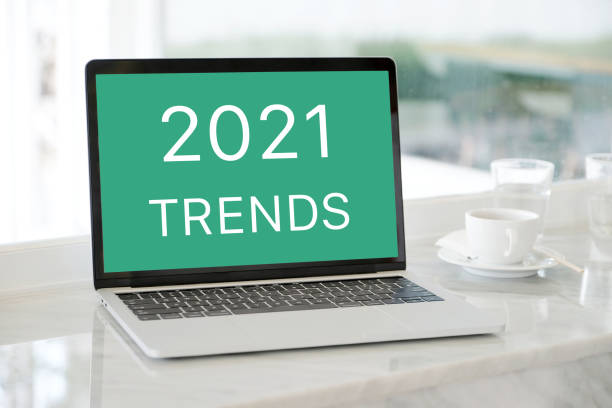 istock 2021 trends on laptop computer screen background, business plan and technology concept 1288552885