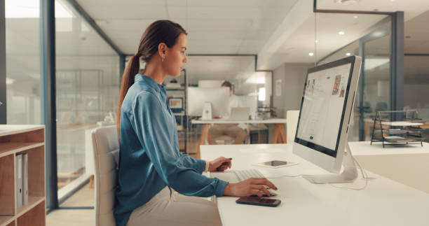 istock Creating new content for her business website 1288553458