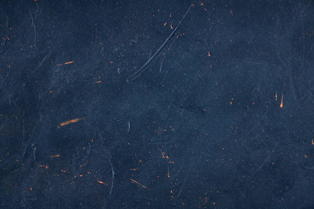 istock Abstract dark blue background in grunge style. 1288556089