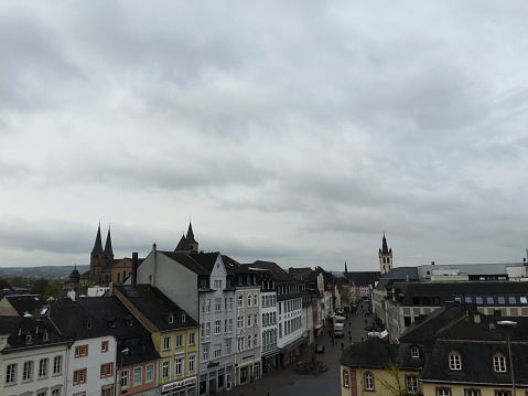 Trier, Germany - 04/25/2016 : view of historic buildings at the famous old town of Trier at cloudy day