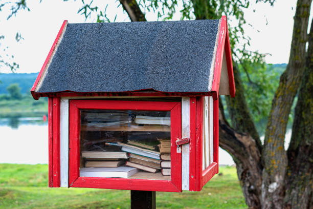 Free red book sharing mini house near the river.