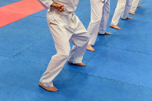 istock Group of people practicing Taekwondo 1288559470