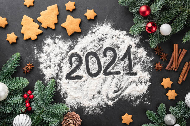 istock New year 2021, Christmas composition with cookies, fir tree 1288559514
