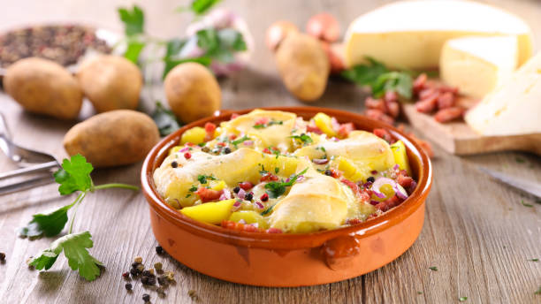 istock tartiflette, baked potato, bacon and cheese 1288560196