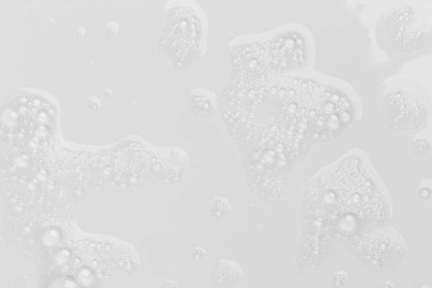 istock Foam bubble from soap or shampoo for washing isolated on white background from above 1288560329