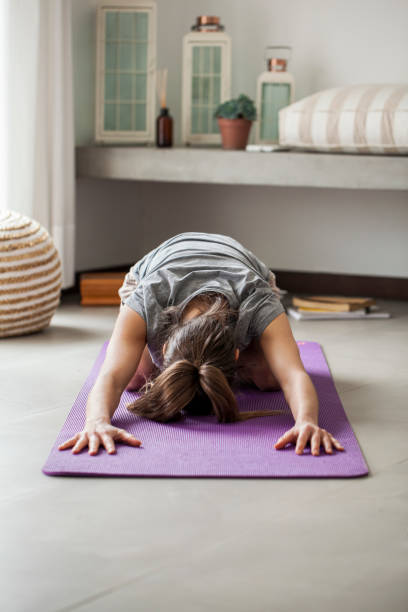 istock Woman exercising yoga 1288561129