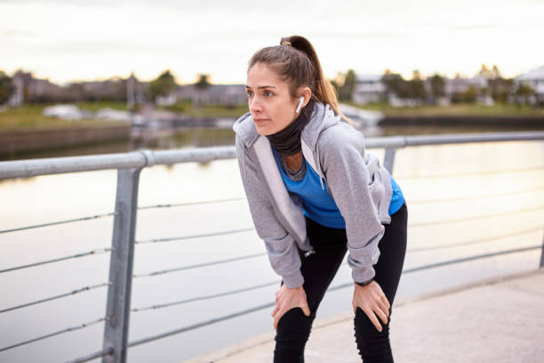 istock Woman exhausted after jogging 1288561288