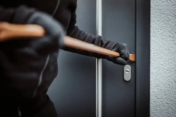 Burglary breaking into family home with a crowbar