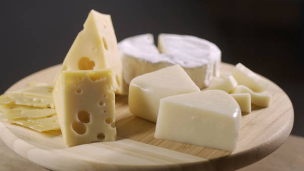 istock Pieces of different cheeses on plate 1288567759