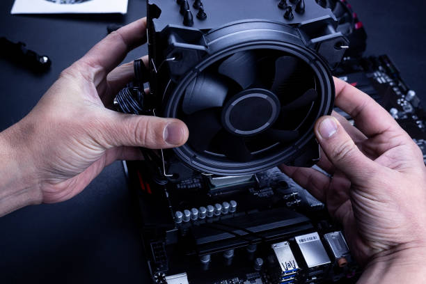 istock Installing or repair the air cooling system of the personal computer processor. 1288568665