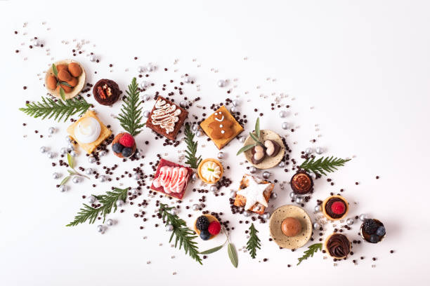 fun, festive assortment of christmas desserts and vegan, gluten-free candy - fruitcake cake fruit dessert imagens e fotografias de stock