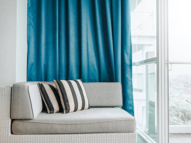 istock Comfortable sofa bed with pillows decorated on balcony and patio. 1288571032