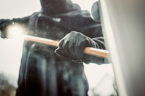 Burglary breaking into family home with a crowbar