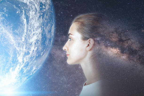 istock Futuristic Goal and Solution Thinking Concept, Double Exposure Overlay Images of Attractive Woman Portrait With Galaxy Space and Planet Earth. Elements of This Image Furnished By NASA 1288574466