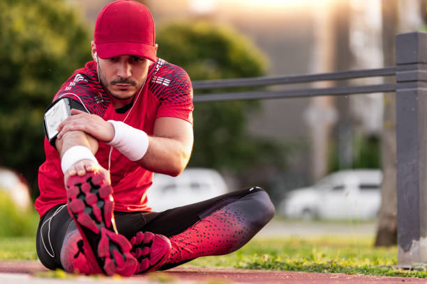 istock Young sportsman preparing for running 1288575316