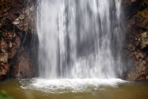istock Kanchanaburi waterfall among rocks in Thailand. 1288576758