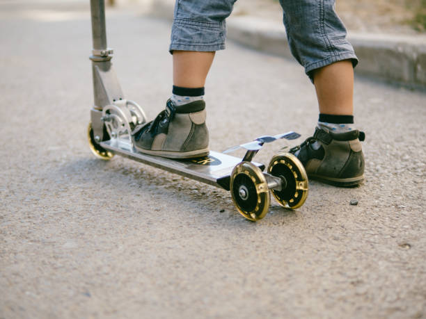 istock Baby boy on scooter 1288576910