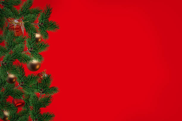 istock Christmas pine tree with xmas decoration on red background 1288578206