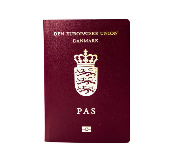 istock Danish passport isolated on white background. 1288579166
