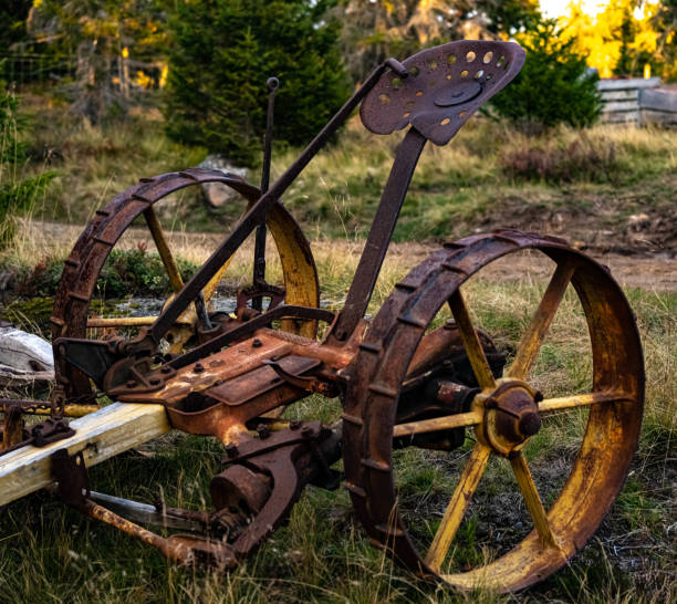 istock Rusted antique seed machine that used horse power. 1288579373