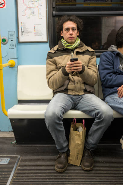 istock young man on the subway in Milan, Italy 1288579430