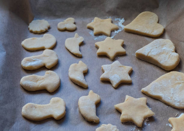 istock Many Christmas Cookies on Parchment Paper 1288582484