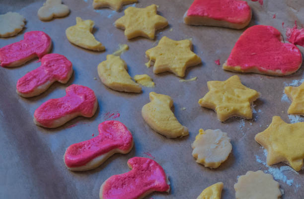 istock Christmas Cookie Shapes on Parchment Paper 1288582513