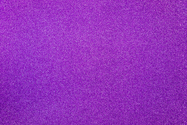 istock Purple giltter texture abstract background. Shiny wrapper paper. 1288584748