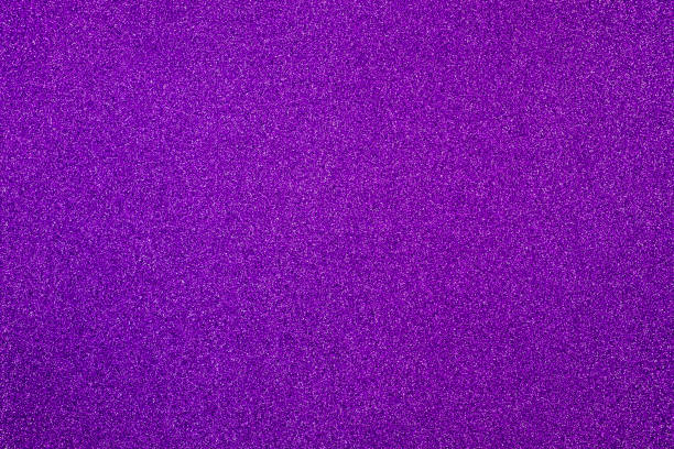 istock Violet giltter texture abstract background. Shiny wrapper paper. 1288585056