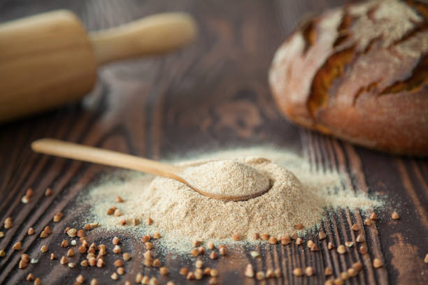 istock Close-up spoon with buckwheat flour 1288586245
