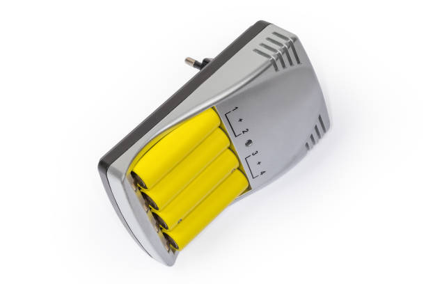 Smart battery charger with inserted rechargeable batteries AA size on a white background