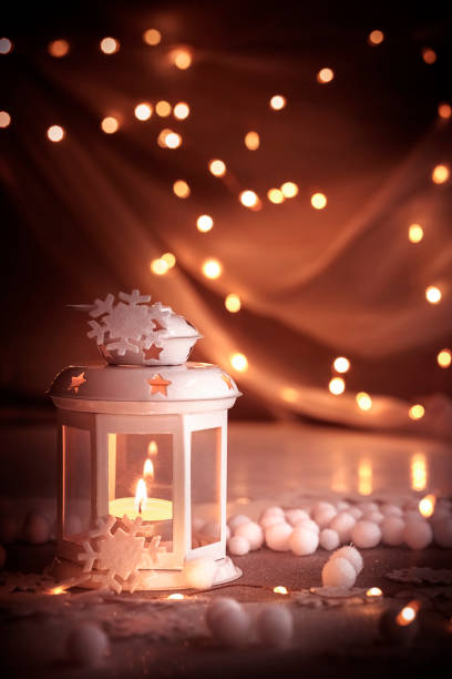 Blurred Lantern with Lit Candle and Christmas Decorations with Copy Space