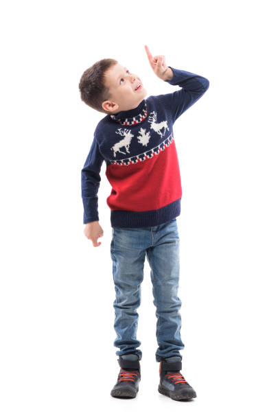 glücklich aufgeregt junges kind in weihnachten pullover mit virtual reality touchscreen zeigen finger nach oben. - moving up child pointing looking stock-fotos und bilder