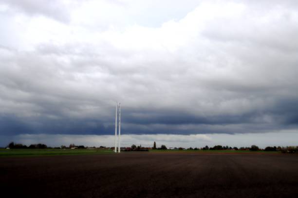 istock Dark cumulus clouds above the Wilde Veenen polder 1288598063