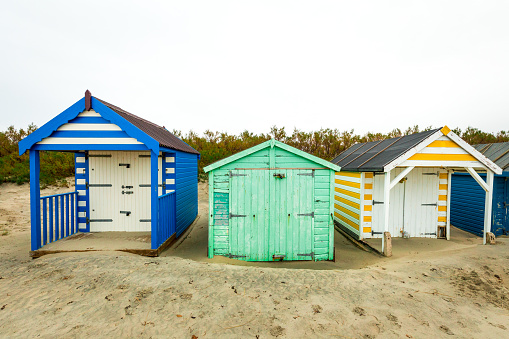 La Bree-les-Bains village wooden brightly coloured beach huts on West atlantic beach french oleron island